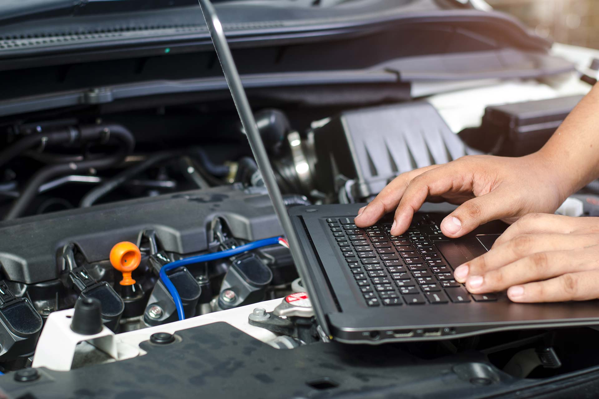 car-diagnostics-laptop-on-car-bonnet